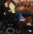 My daughter's powered chair at one of the high tables.