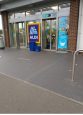 Level access entrance with automatic doors